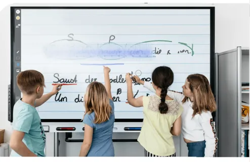 Children using the smart whiteboard