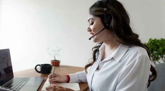 a-woman-using-bluetooth-headset-for-calls