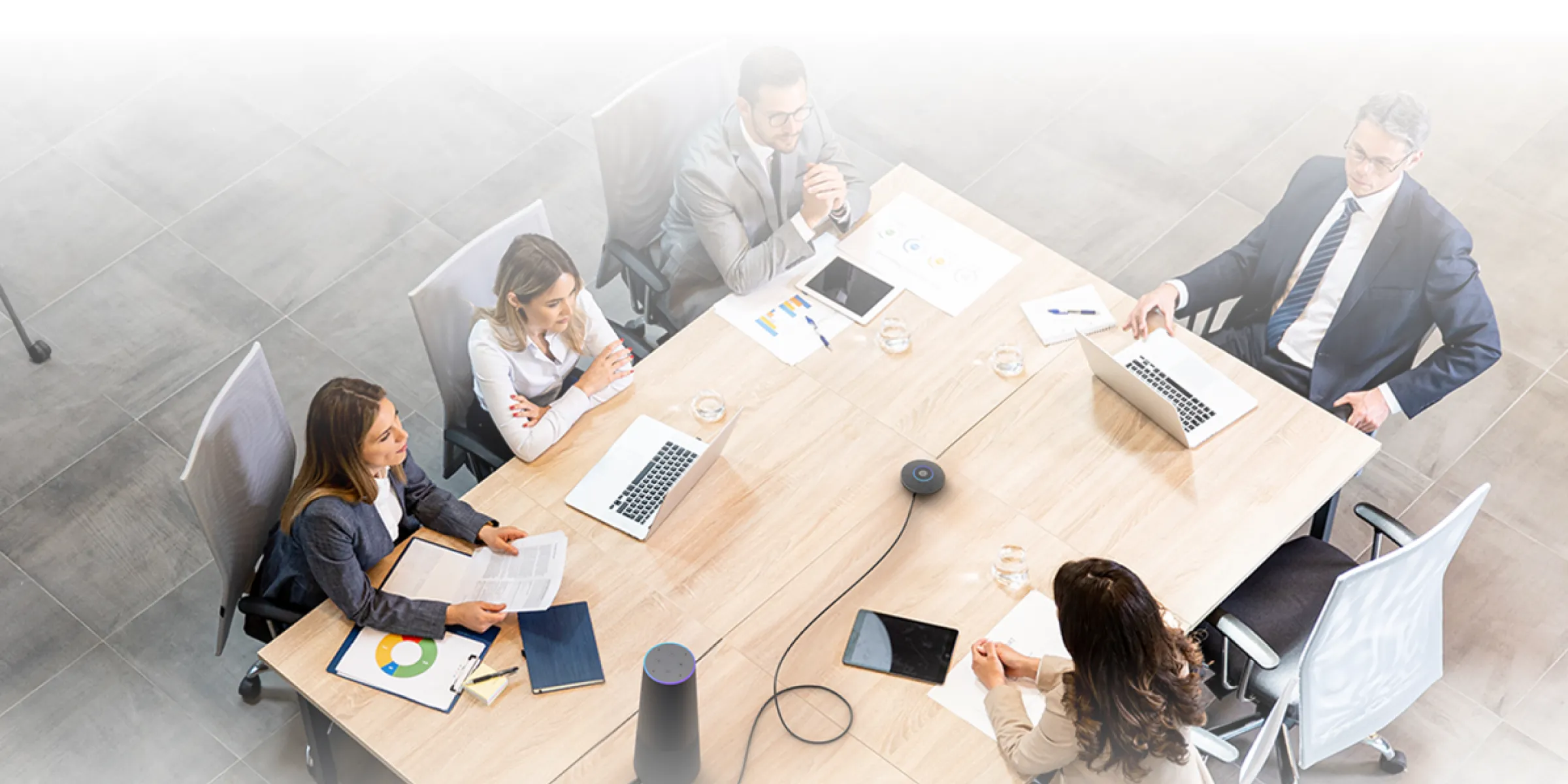 Several people in a conference room using NearHub board S pro smart whiteboard for office in a meeting