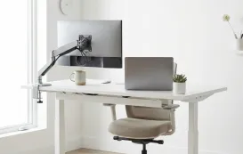 Modern home office setup featuring a white NearHub electric adjustable standing desk. Best cheap standing desk under $300 with dual motor and ergonomic design.