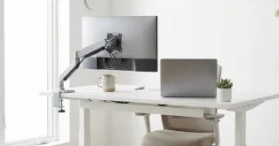 Modern home office setup featuring a white NearHub electric adjustable standing desk. Best cheap standing desk under $300 with dual motor and ergonomic design.