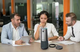 Accountants in a meeting using the Nearity 120 Max conference camera in an accounting firm office.