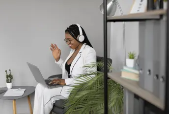 medium-shot-woman-working-with-laptop