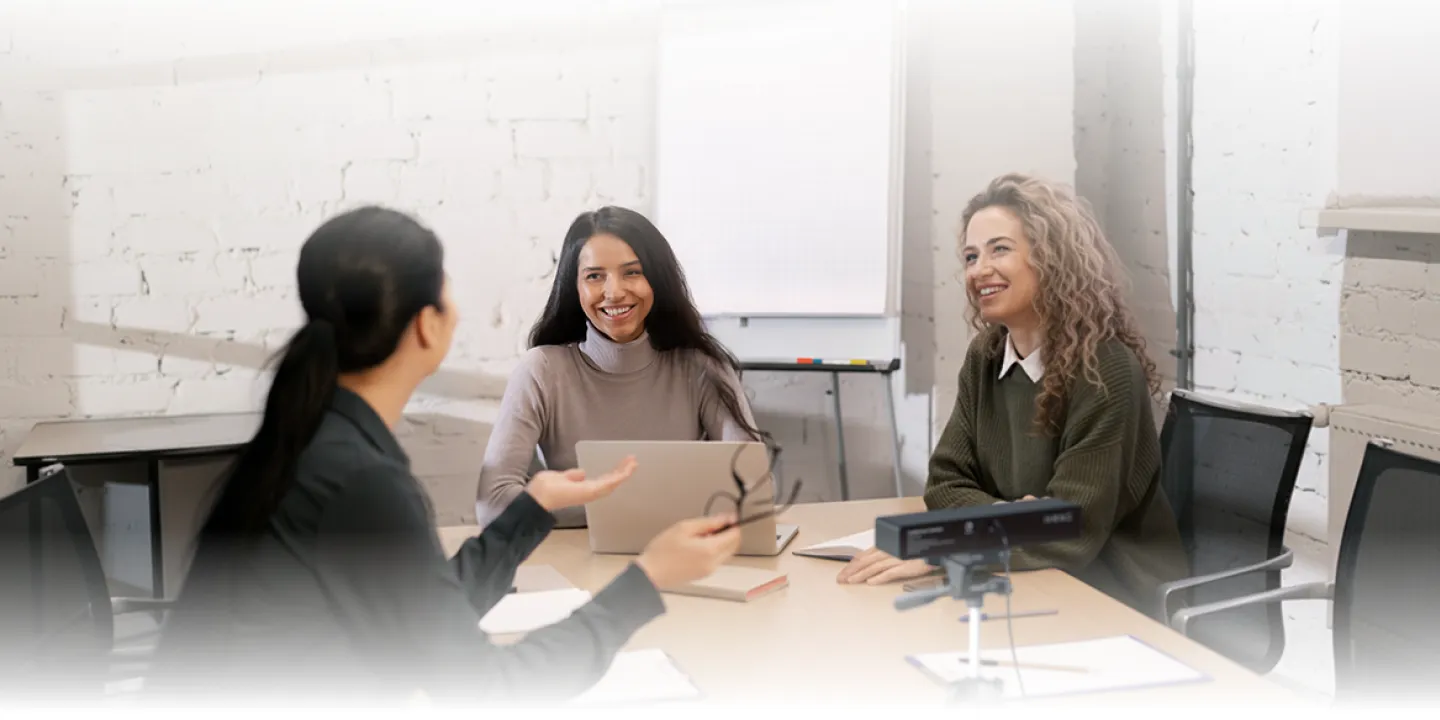 Several people in a conference room using Nearity V30S Conference Webcam for office in a meeting