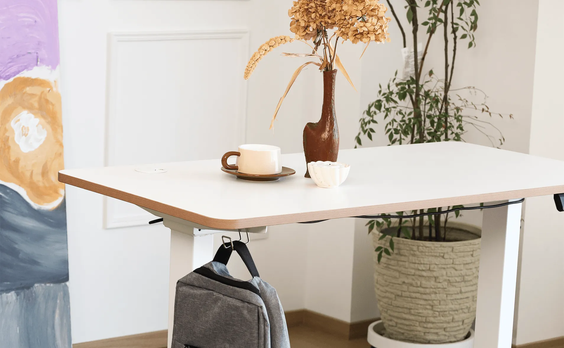 White electric sit to stand desk