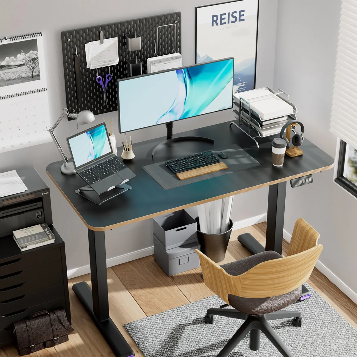 Black adjustable height computer desks