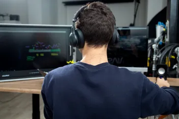 person-earphones-while-work