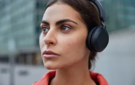 this female is talking with best single ear bluetooth headset for phone calls on her head