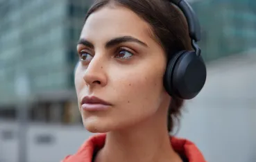 this female is talking with best single ear bluetooth headset for phone calls on her head