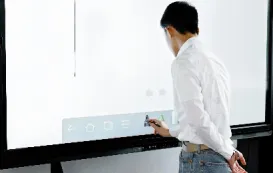 a teacher using notebook whiteboard
