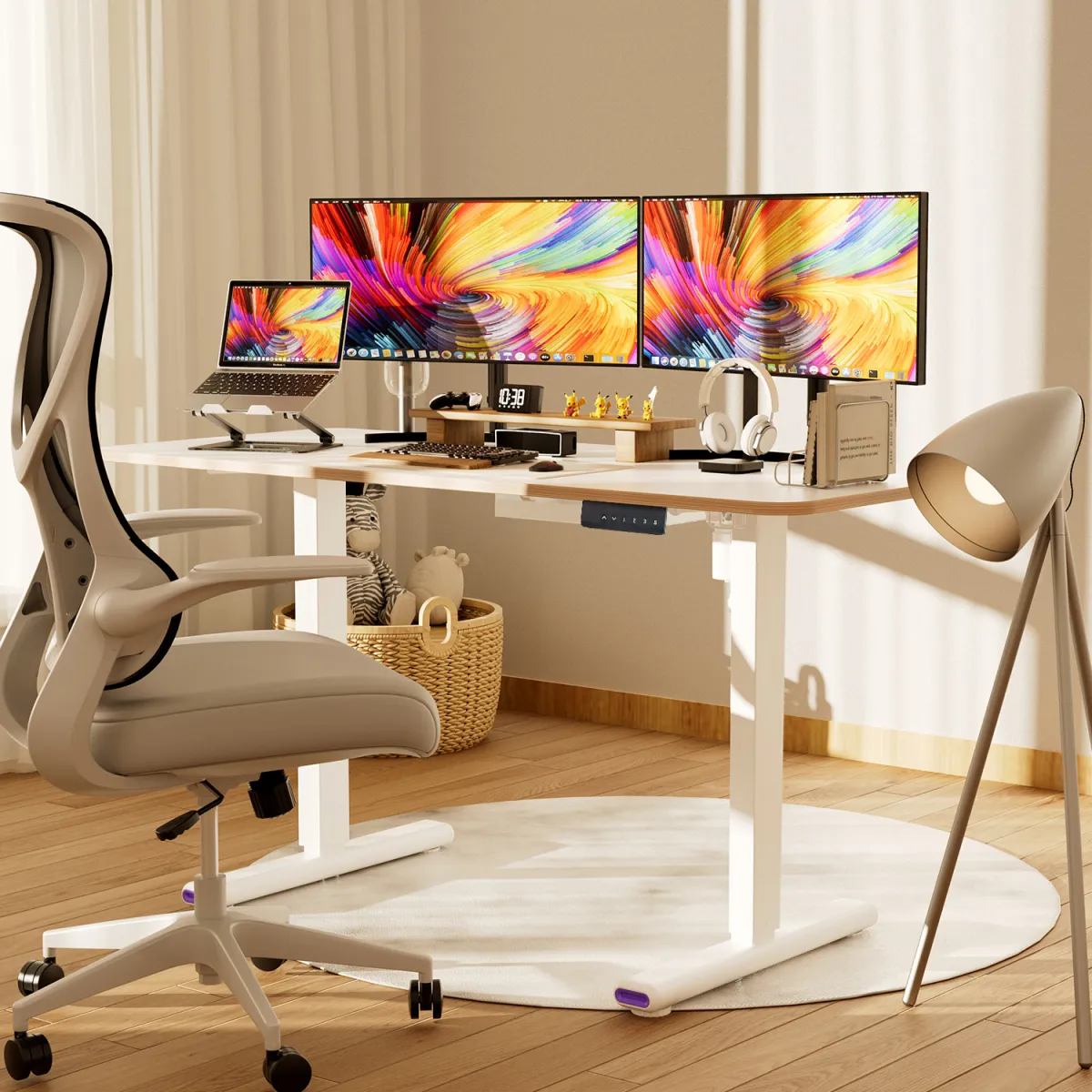 The standing computer desk beside a gray ergonomic chair