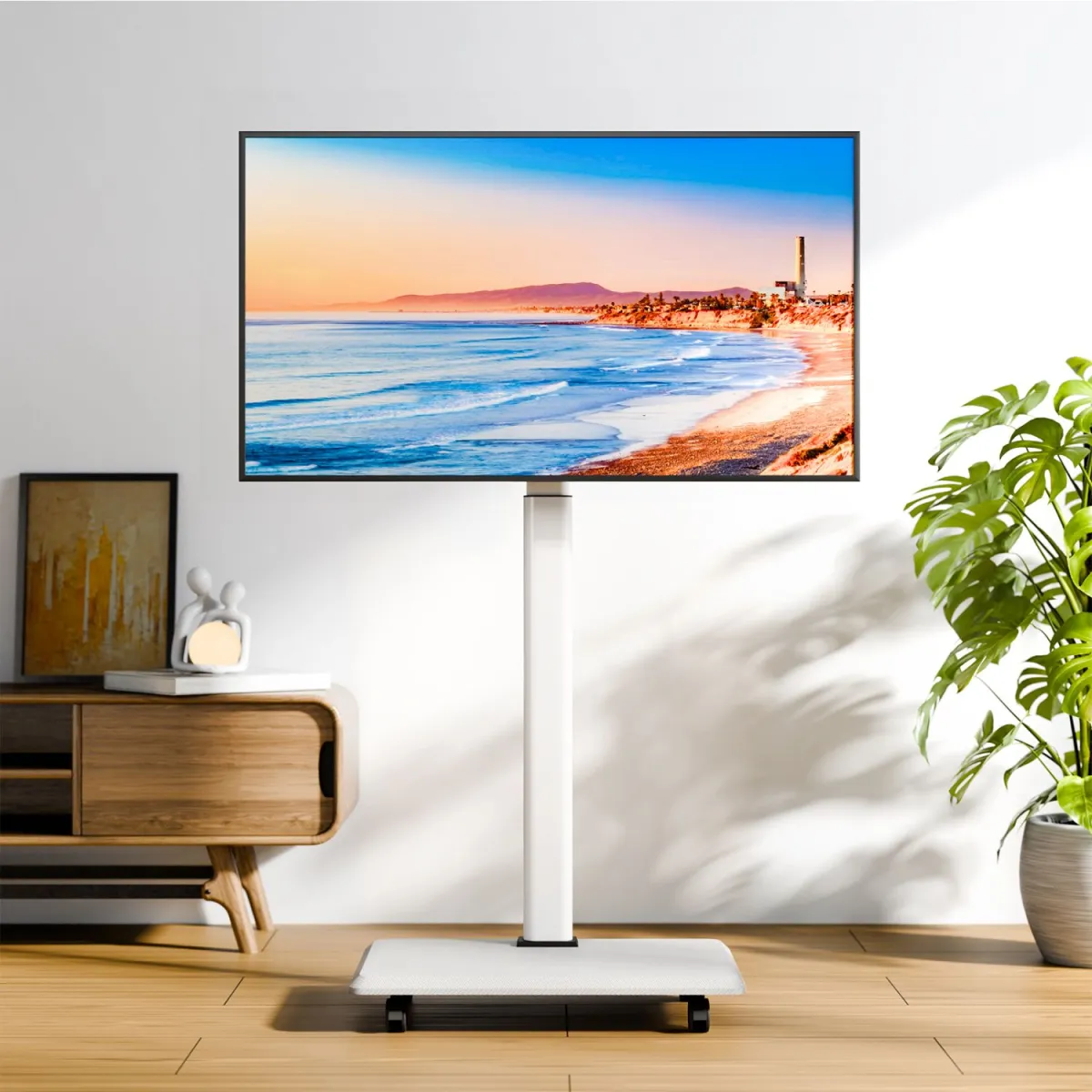 White rolling stand tv